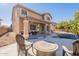Home exterior with pool and patio at 2734 E Birchwood Pl, Chandler, AZ 85249