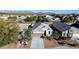 Aerial view of single-story home and surrounding neighborhood at 3841 N 293Rd Dr, Buckeye, AZ 85396