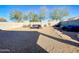 Backyard featuring a hot tub, pergola, and a water fountain at 3841 N 293Rd Dr, Buckeye, AZ 85396