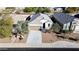 One-story house with a brown garage door and desert landscaping at 3841 N 293Rd Dr, Buckeye, AZ 85396