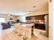 Open concept kitchen with island and living room views at 3841 N 293Rd Dr, Buckeye, AZ 85396