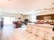 Kitchen with island, granite countertops, and stainless steel appliances at 3841 N 293Rd Dr, Buckeye, AZ 85396