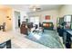 Spacious living room with sliding doors to backyard and comfy seating at 3841 N 293Rd Dr, Buckeye, AZ 85396
