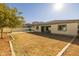 Expansive backyard features a spacious lawn, perfect for outdoor activities at 4747 S Aileron Ln, Mesa, AZ 85212
