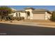 Charming home with well-maintained landscaping and a two-car garage at 4747 S Aileron Ln, Mesa, AZ 85212