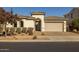 Charming home with well-maintained landscaping and a two-car garage at 4747 S Aileron Ln, Mesa, AZ 85212