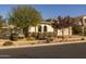 Charming home with well-maintained landscaping and a two-car garage at 4747 S Aileron Ln, Mesa, AZ 85212