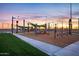 Community playground with swings, slides, and shade structures perfect for Gathering fun in the neighborhood at 4747 S Aileron Ln, Mesa, AZ 85212
