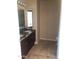 Bathroom boasts dual sinks and granite vanity at 4808 N 24Th St # 824, Phoenix, AZ 85016