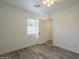 Light-filled bedroom featuring wood-look floors at 5039 N 18Th Ave, Phoenix, AZ 85015