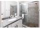 Bathroom boasts granite countertops and a spacious shower at 5450 E Deer Valley Dr # 1004, Phoenix, AZ 85054