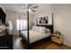 Spacious bedroom with a post bed and plenty of natural light at 5450 E Deer Valley Dr # 1004, Phoenix, AZ 85054