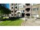 Exterior view of an apartment building with landscaping at 5450 E Deer Valley Dr # 1004, Phoenix, AZ 85054