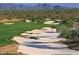 Picturesque golf course with sand traps and mountain backdrop at 5450 E Deer Valley Dr # 1004, Phoenix, AZ 85054