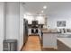 Modern condo kitchen with granite countertops and stainless steel appliances at 5450 E Deer Valley Dr # 1004, Phoenix, AZ 85054
