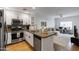 Modern condo kitchen with granite countertops and stainless steel appliances at 5450 E Deer Valley Dr # 1004, Phoenix, AZ 85054