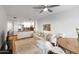 Living room with sectional sofa and wood dining table at 5450 E Deer Valley Dr # 1004, Phoenix, AZ 85054