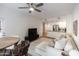 Living room with sectional sofa and wood dining table at 5450 E Deer Valley Dr # 1004, Phoenix, AZ 85054