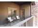 Small patio with two chairs and a table at 5450 E Deer Valley Dr # 1004, Phoenix, AZ 85054