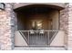 Private patio with metal railing and chairs at 5450 E Deer Valley Dr # 1004, Phoenix, AZ 85054