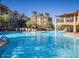 Large community pool with surrounding lounge area at 5450 E Deer Valley Dr # 1004, Phoenix, AZ 85054