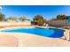 Relax and unwind in this inviting kidney-shaped pool at 6022 W Mauna Loa Ln, Glendale, AZ 85306