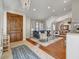 Bright and airy entryway with hardwood floors, leading to living room and dining area at 6836 E Ludlow Dr, Scottsdale, AZ 85254