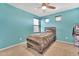 Small bedroom with a twin bed and neutral decor at 7143 W Golden Ln, Peoria, AZ 85345