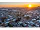 Aerial shot showcasing the home's neighborhood and surrounding area at sunset at 7416 E Holly St, Scottsdale, AZ 85257