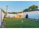Private backyard oasis with putting green and pool at 7416 E Holly St, Scottsdale, AZ 85257
