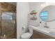 Clean bathroom with a walk in shower and updated vanity at 7416 E Holly St, Scottsdale, AZ 85257