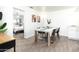Kitchen features an eat-in dining area with a wooden table at 7416 E Holly St, Scottsdale, AZ 85257