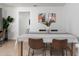 Bright dining area with wooden table and leather chairs at 7416 E Holly St, Scottsdale, AZ 85257