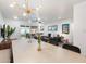 Bright dining area with a large table and access to the backyard at 7416 E Holly St, Scottsdale, AZ 85257