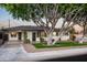 Updated single-story home with artificial turf and mature trees at 7416 E Holly St, Scottsdale, AZ 85257