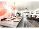 Bright and airy living room with a large sectional sofa and modern decor at 7416 E Holly St, Scottsdale, AZ 85257