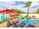 Relaxing pool area with fun floats and mural at 7416 E Holly St, Scottsdale, AZ 85257