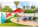 Inviting pool with fun floats and a Scottsdale-themed wall at 7416 E Holly St, Scottsdale, AZ 85257
