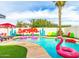 Relaxing pool area with flamingo floats and fun decor at 7416 E Holly St, Scottsdale, AZ 85257