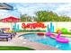 Relaxing pool with flamingo floats and mural at 7416 E Holly St, Scottsdale, AZ 85257