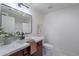 Modern bathroom with marble vanity and updated fixtures at 750 E Northern Ave # 1053, Phoenix, AZ 85020