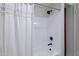 Clean bathroom with shower/tub and white tile at 750 E Northern Ave # 1053, Phoenix, AZ 85020