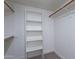 Spacious closet with shelves and hanging rods at 750 E Northern Ave # 1053, Phoenix, AZ 85020