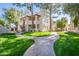 Attractive exterior of a condo building with lush landscaping and walkways at 750 E Northern Ave # 1053, Phoenix, AZ 85020