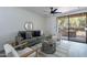 Living room with grey couch, round coffee table, and fireplace at 750 E Northern Ave # 1053, Phoenix, AZ 85020
