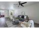 Living room features a comfortable couch and access to patio at 750 E Northern Ave # 1053, Phoenix, AZ 85020