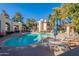Community pool with lounge chairs and tables at 750 E Northern Ave # 1053, Phoenix, AZ 85020