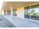 Covered patio with concrete flooring and sliding doors at 7806 E San Carlos Rd, Scottsdale, AZ 85258