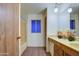 Clean bathroom with double vanity and wood cabinets at 816 S Esperanza Ave, Mesa, AZ 85208
