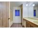 Clean bathroom with double vanity and wood cabinets at 816 S Esperanza Ave, Mesa, AZ 85208